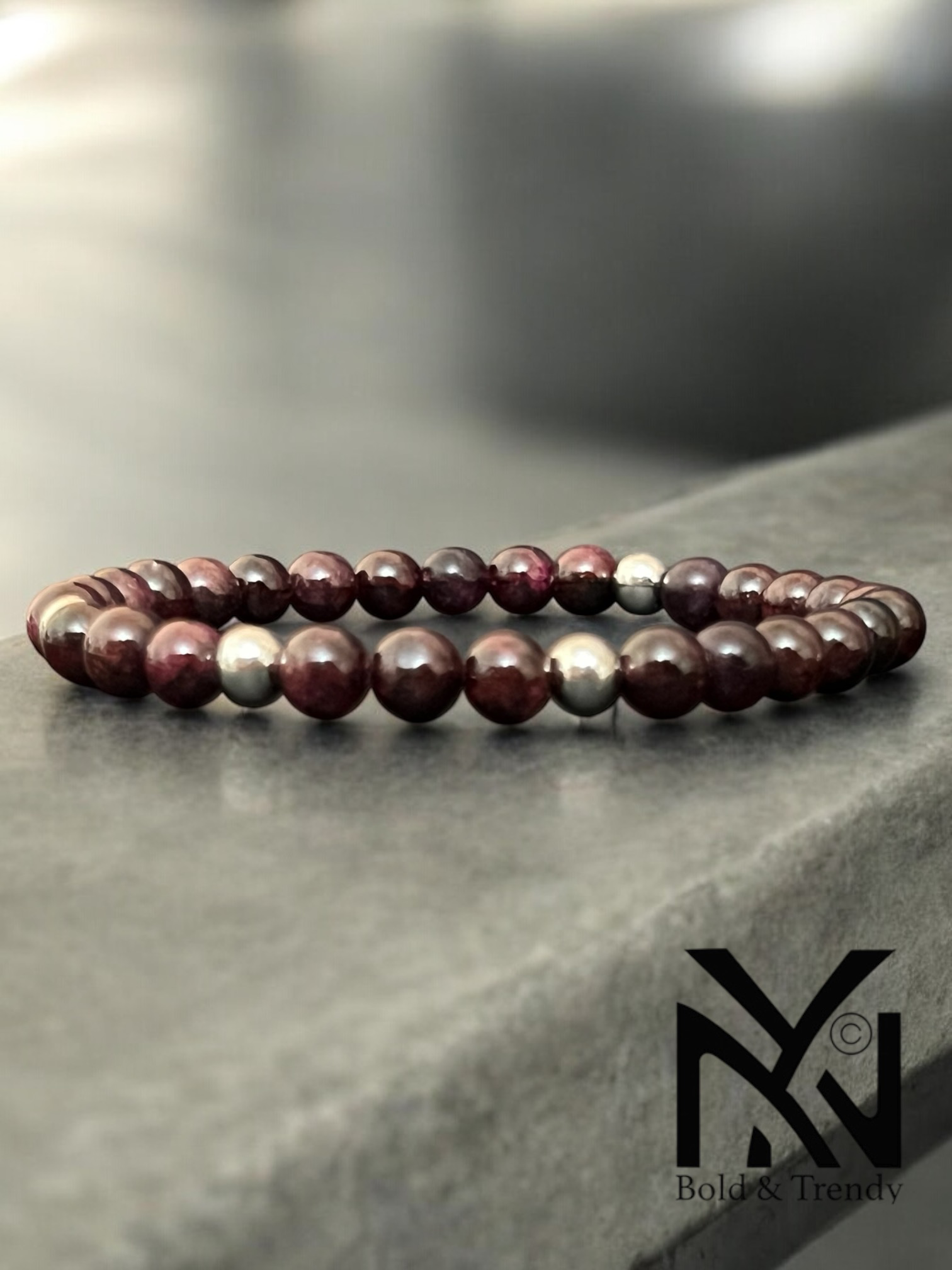 Forêt Enchantée bracelet with medium garnet stones, symbolizing vitality, passion, and grounding energy