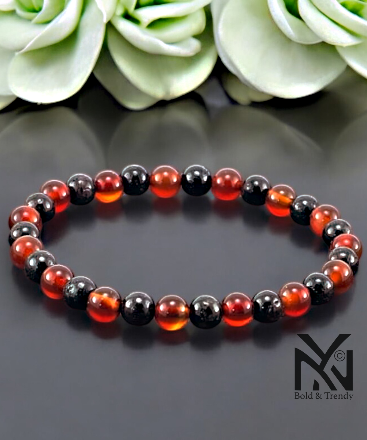 Flamme d'Automne bracelet showcasing red, amber, and gold hues, promoting emotional clarity and focus